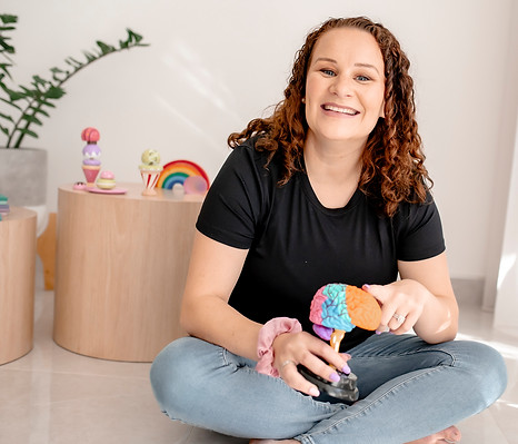 Claire Britton holding a model brain