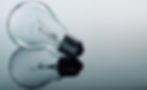 lightbulb on the side with dark blue background