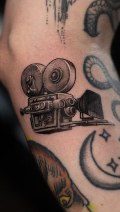 Vintage Film Camera Tattoo in Black and Grey Realism