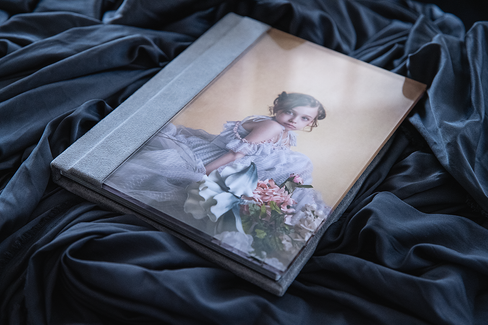 photo album laying on a black backdrop