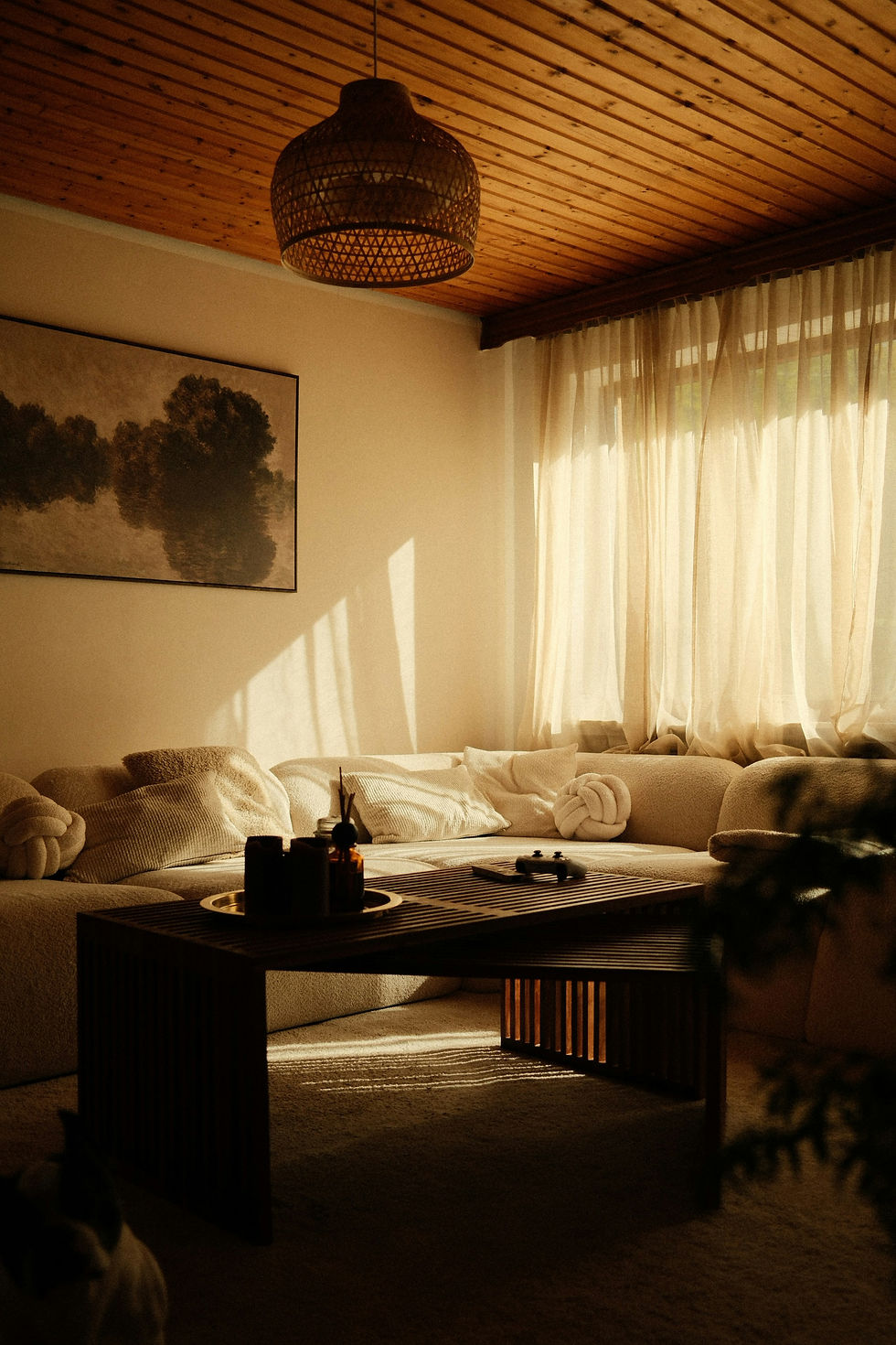 Warm sunlight in a neutral living room, editorial home inspiration