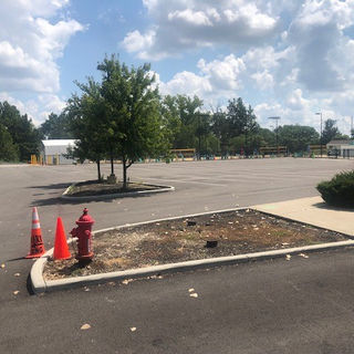 Parking lot paved with hydrant.