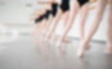 legs of young dancers ballerinas in clas