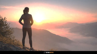A person stands on a hilltop, gazing at a sunrise over misty mountains. The sky is orange and pink, evoking a serene and contemplative mood. "The Power of Self-Discipline: Your Complete Guide to Lasting Change"