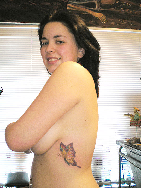 Young woman and her rib butterfly.
