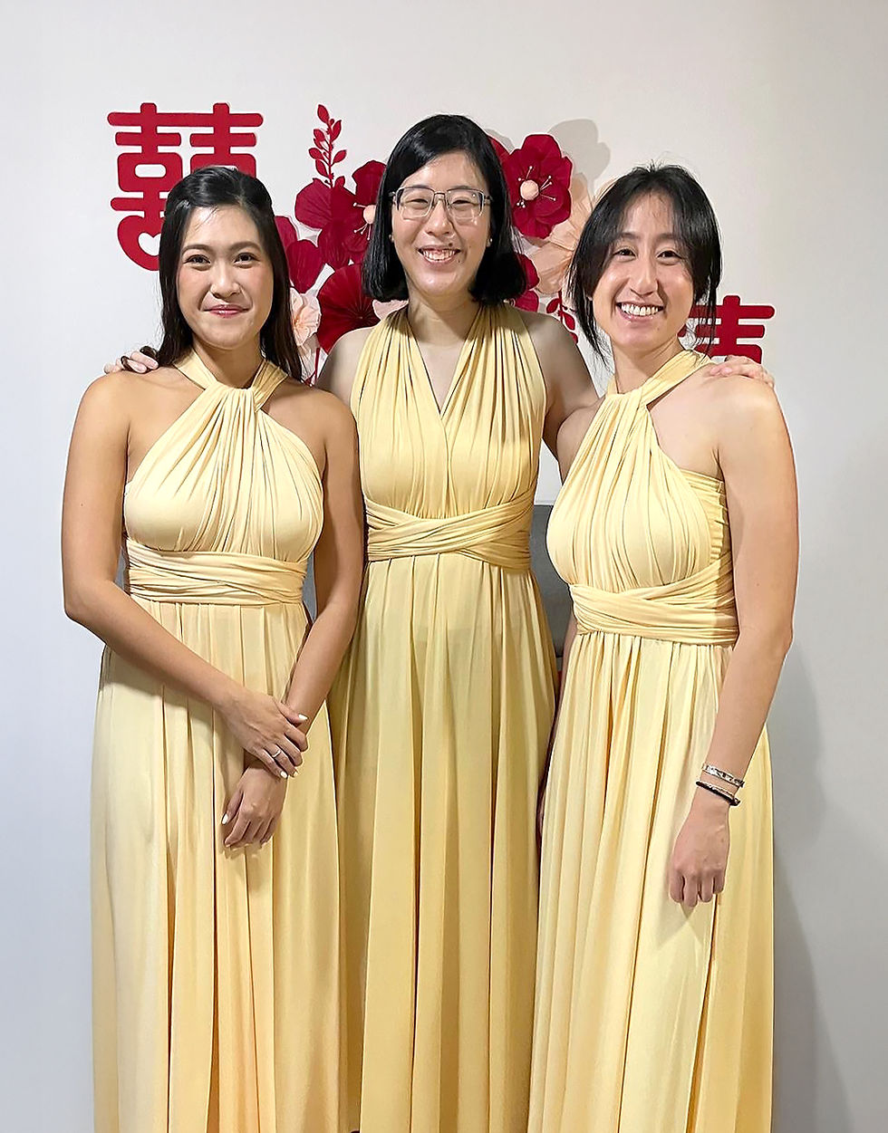 Bridesmaids in a Singapore Wedding wearing My Little Bow's Butter Yellow convertible bridesmaid dresses.