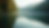 Close-up view of a serene nature scene with a calm lake and surrounding trees