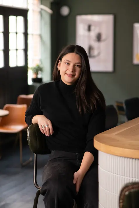 In situ corporate headshot of a Hue & Cry agency team member. Professional on-location business portrait and creative agency staff photography by Patryk Majewski at Patryk Creative.