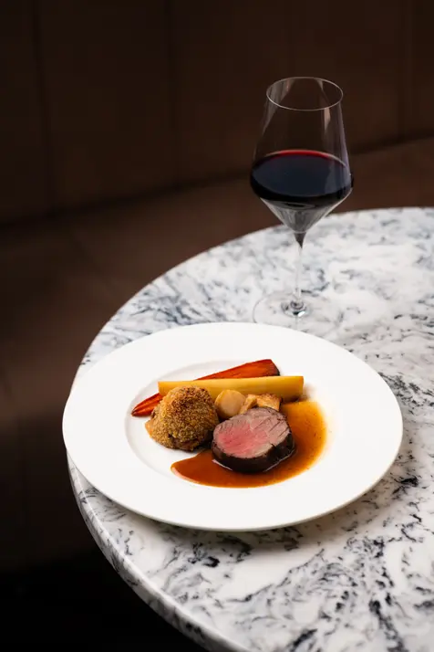 Fine dining photography of a steak dish at Chelmsford City Racecourse. Professional restaurant imagery with elegant food styling by Patryk Majewski at Patryk Creative.