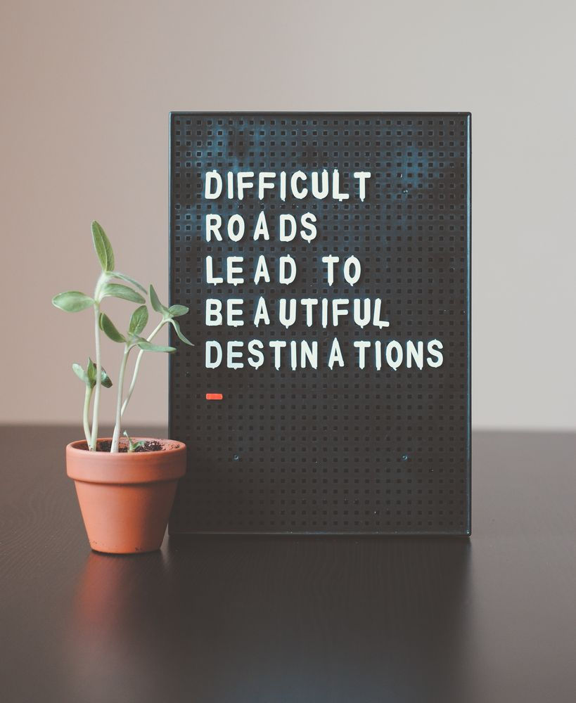 Poster saying "Difficult roads lead to beautiful destinations.Definitions of counselling What is Counselling About. Fiona Hewkin Counselling