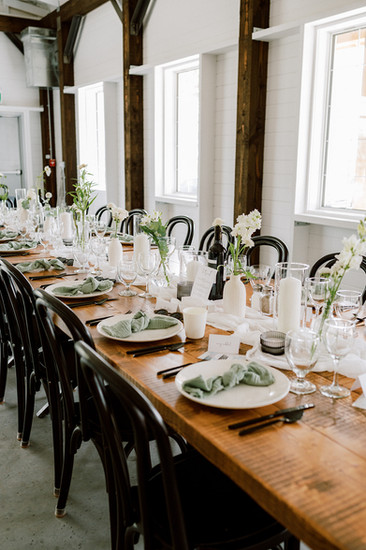 Gorgeous table decore inside the wedding venue Lily Stone Gardens in winnipeg Manitoba