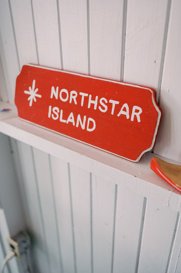 Wooden plaque that says Northstar Island