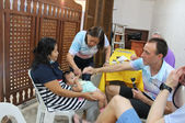 Operation Rainbow Australia medical team perform a physical exam on the children with cleft 