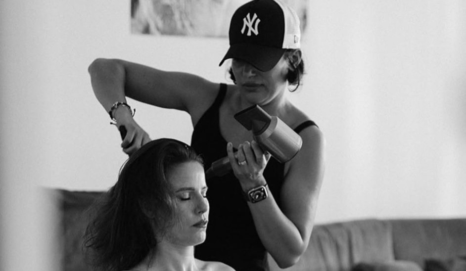 Make-up artist Savriniso creating look for the bride