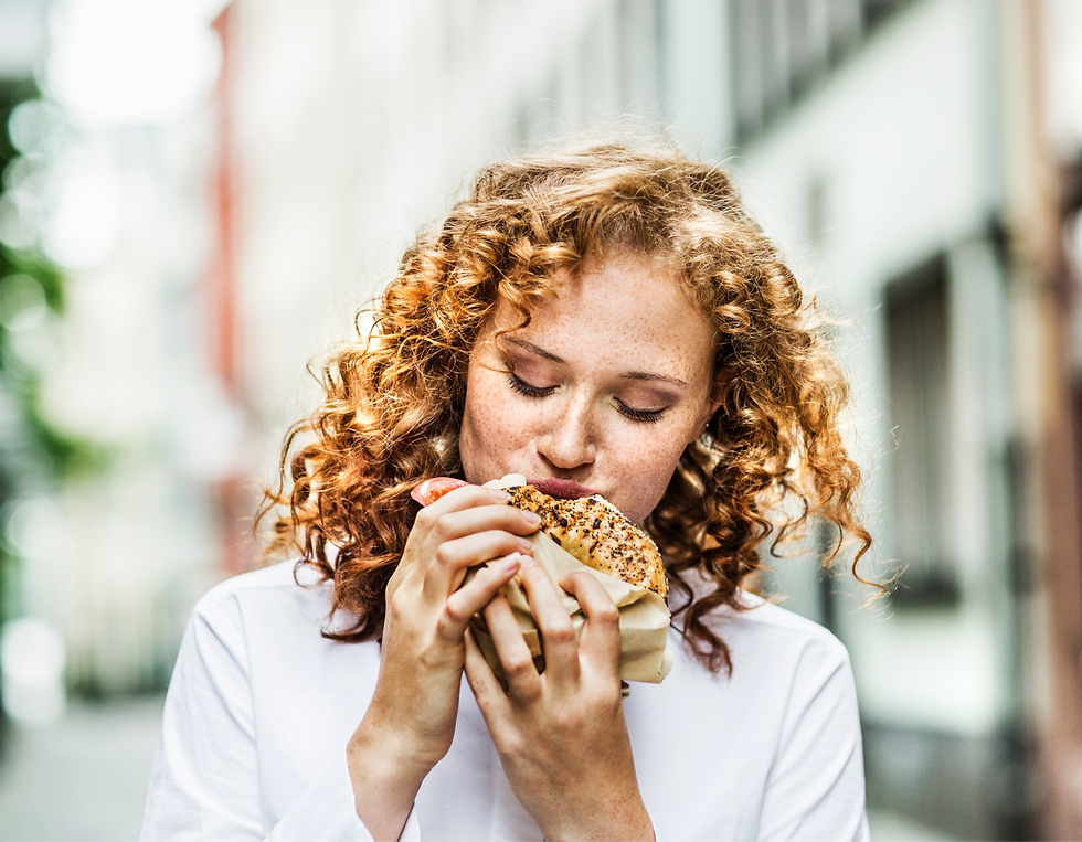 Woman enjoying a sandwich