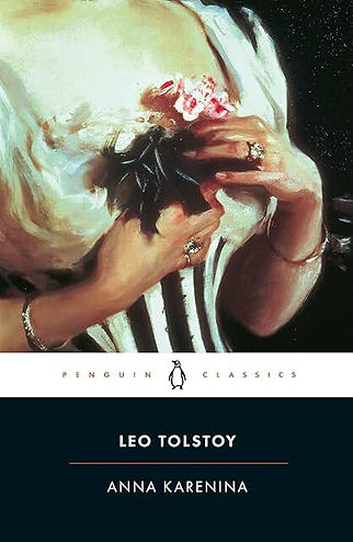 Vintage Anna Karenina cover showing a woman adjusting a flower corsage; Penguin Classics, Leo Tolstoy title on dark background.