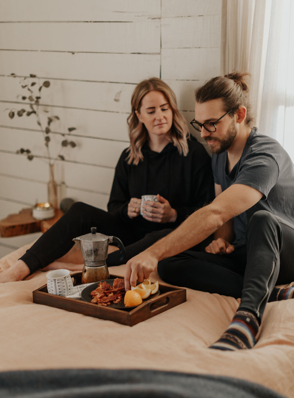 Couple enjoying a cozy moment together having breakfast. 