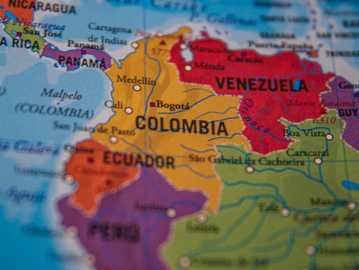 Close-up of a colorful political map of northern South America, showing Colombia, Venezuela, Ecuador, Panama, and nearby country names.