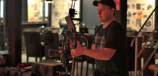 camera operator justin Eckert filming a scene