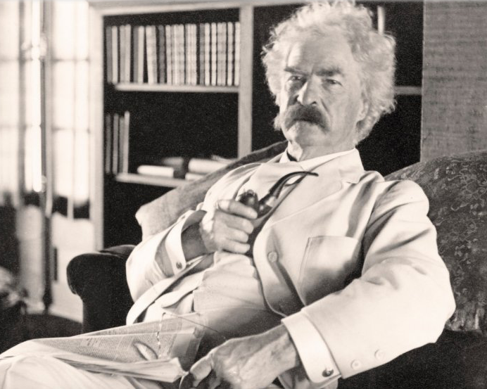 Picture of Mark Twain in a white suit