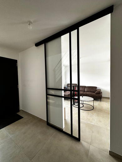 Porte coulissante en métal à Cappelle-la-Grande