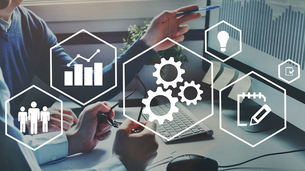 Two people working at a desk with a laptop, overlaid with business process and productivity icons in hexagon shapes.