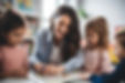 classroom-sitting-teacher-child.jpg