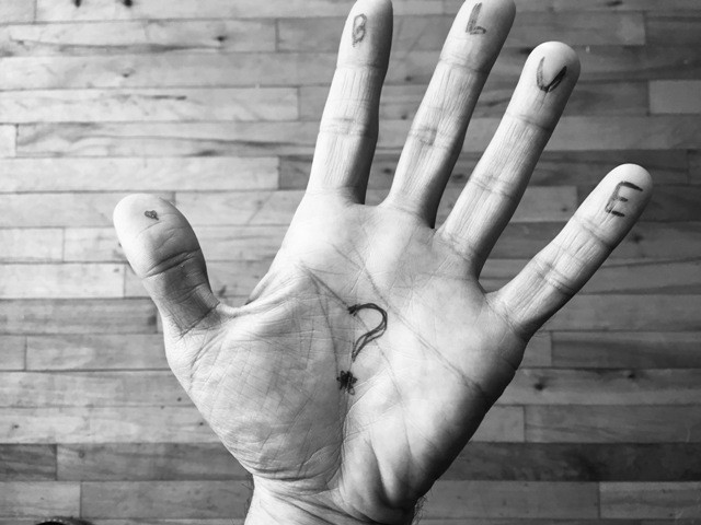 image of hand asking whether faith should be blue