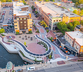 Aerial view of downtown St. Charles, Illinois, featuring First Street Plaza and the Fox River
