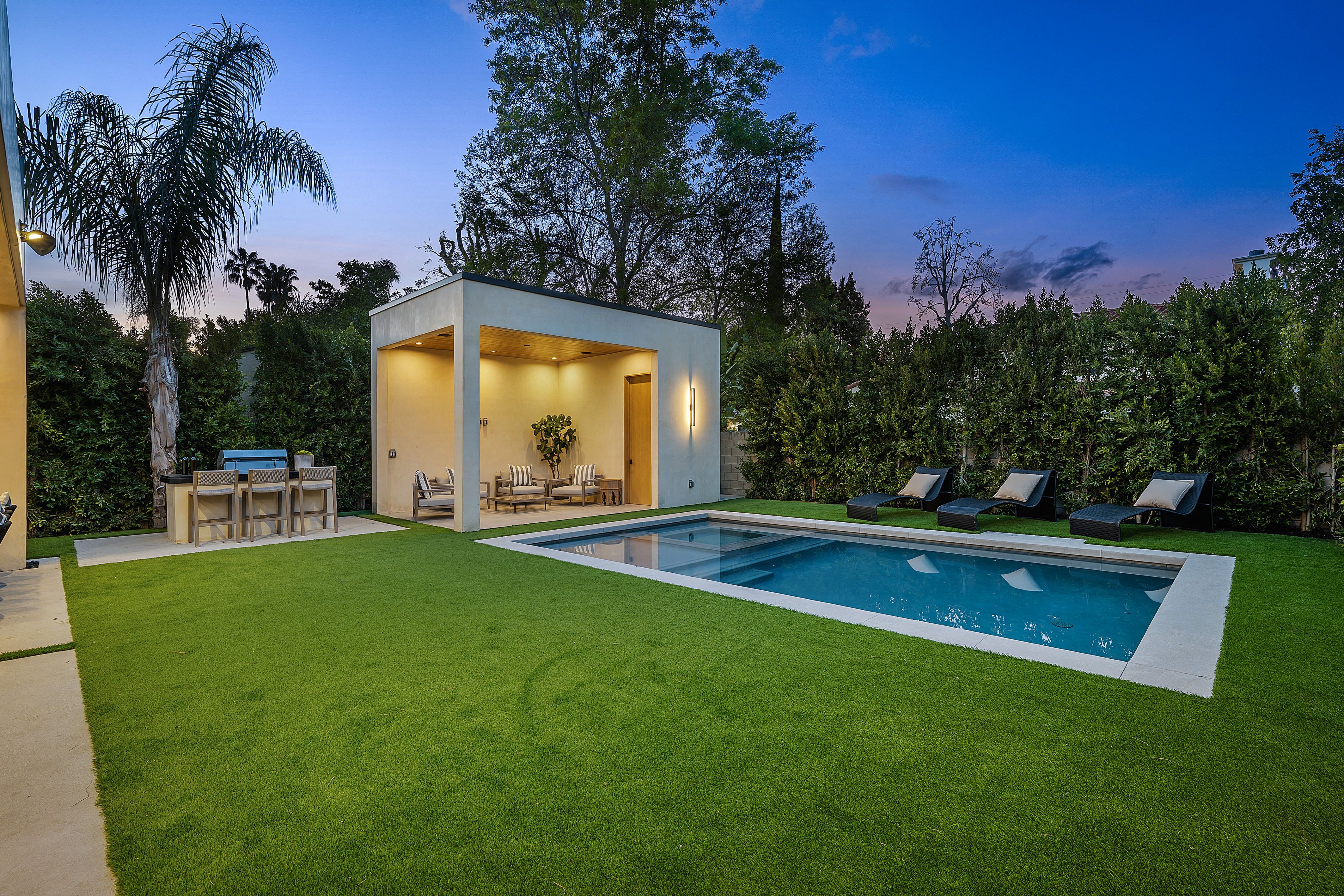 modern-backyard-with-pool-and-patio-at-twilight-2025-02-10-06-40-43-utc.jpg