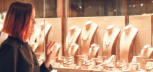 woman looking at jewellery