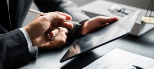 consultant explaining Business Insurance Premium