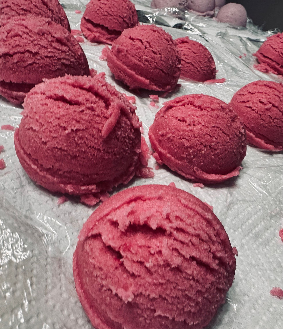 Eye-level view of a glass jar filled with lavender bath soak