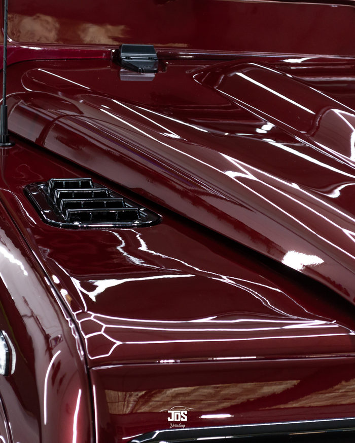 Deep red bonnet with a glossy protected finish
