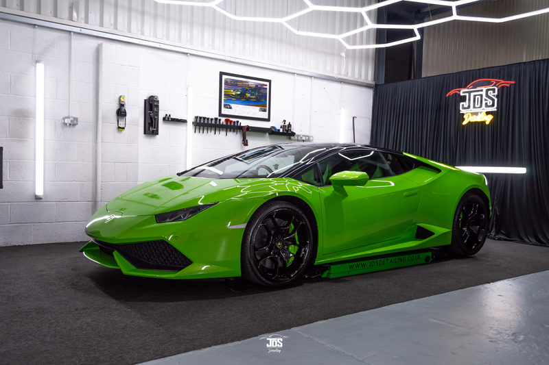 Green Lamborghini convertible in the studio