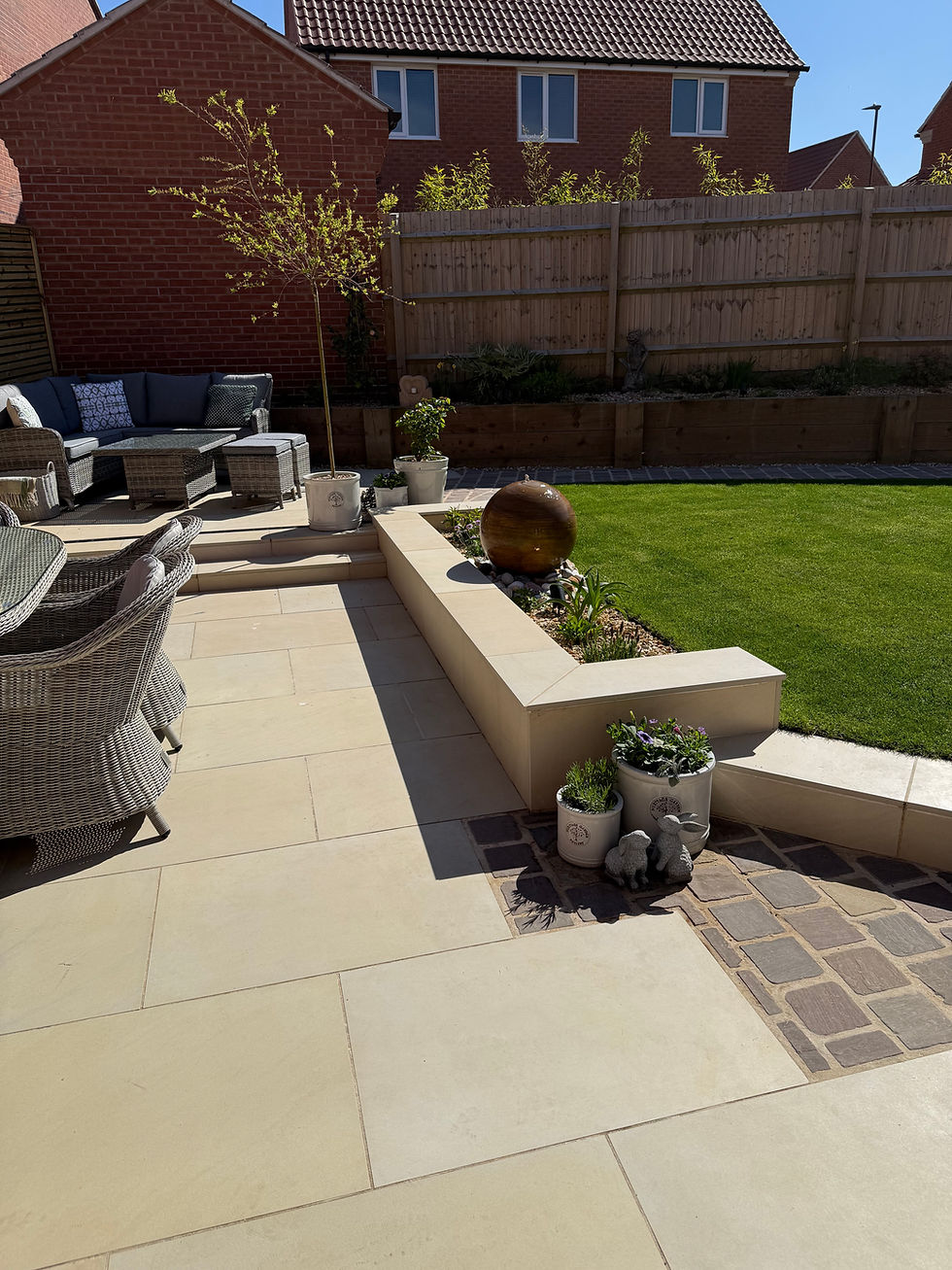 CM Porcelain and Sandstone Paving.jpeg
