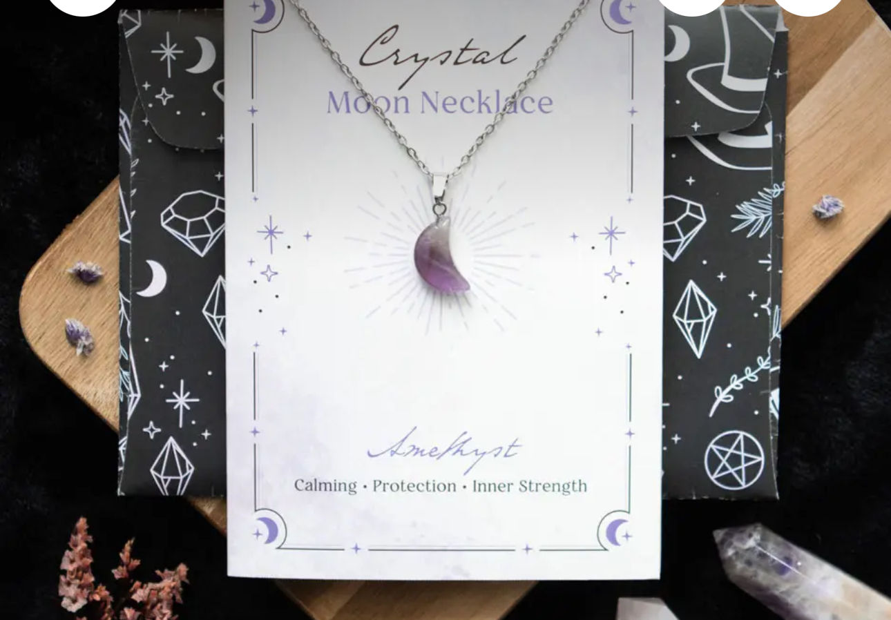Amethyst crystal moon necklace on greeting card