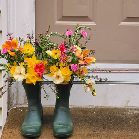 spring flowers in rain boots