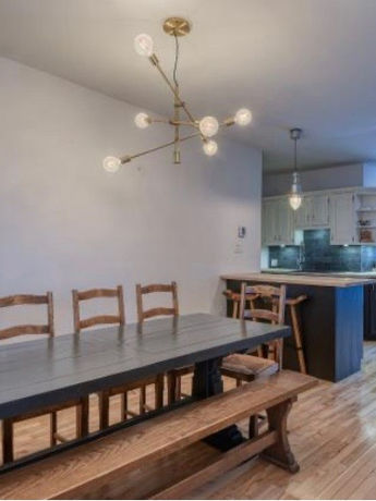 Refectory table, wooden bench, spoutnik light