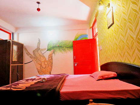 Serene Om Yoga Ashram room in Dharamshala with calm and minimalist decor