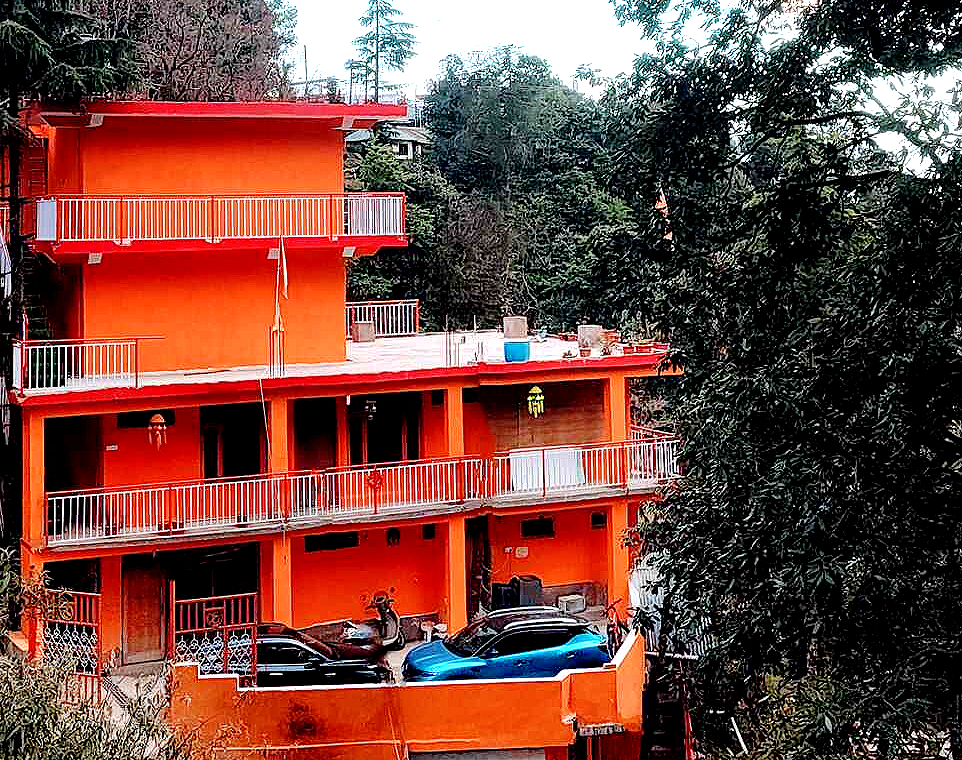 Students practicing yoga during a 200 hour yoga teacher training course at an international retreat with scenic natural surroundings