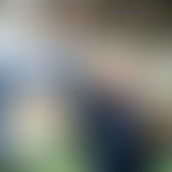 men high-fiving in a warehouse after completing a transaction