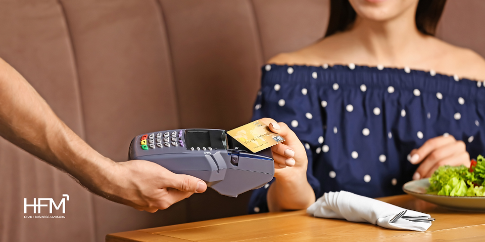 a restaurant guest presenting payment for service