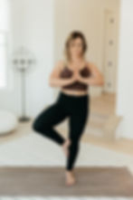 a woman practicing yoga