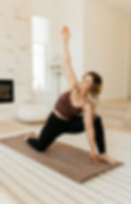 a woman practicing yoga
