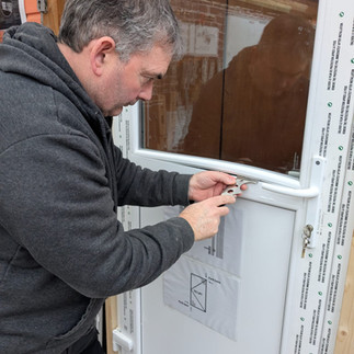 Locksmith student learsn about UPVC doors, toe and heeling as part of a locksmith course with Cornwall and Devon Locksmith Training, Newquay Cornwall. 