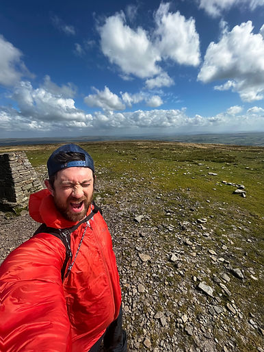James at the top of a Yorkshire Mountain peak
