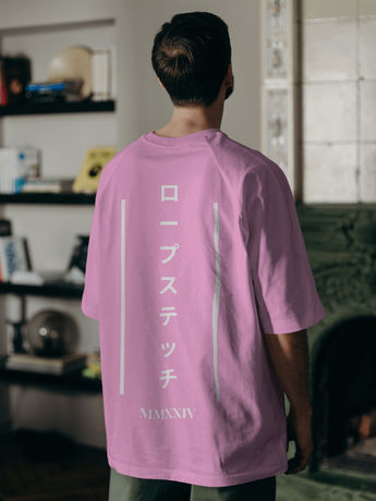 Man wearing plain pink oversized T-shirt by Ropestitch
