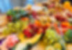 Vibrant charcuterie ingredients including strawberries, brie, and cured meats used in Graze by Lynne-Lee boards and tables
