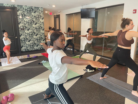 On-site fitness class promoting employee wellness in an office setting